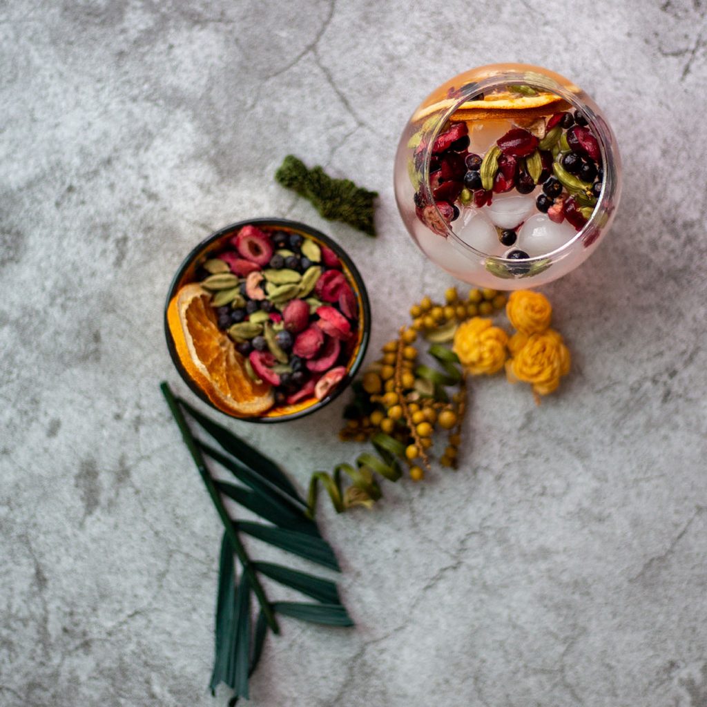 Garnished gin and tonic top view