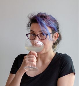 woman drinking lemon drop