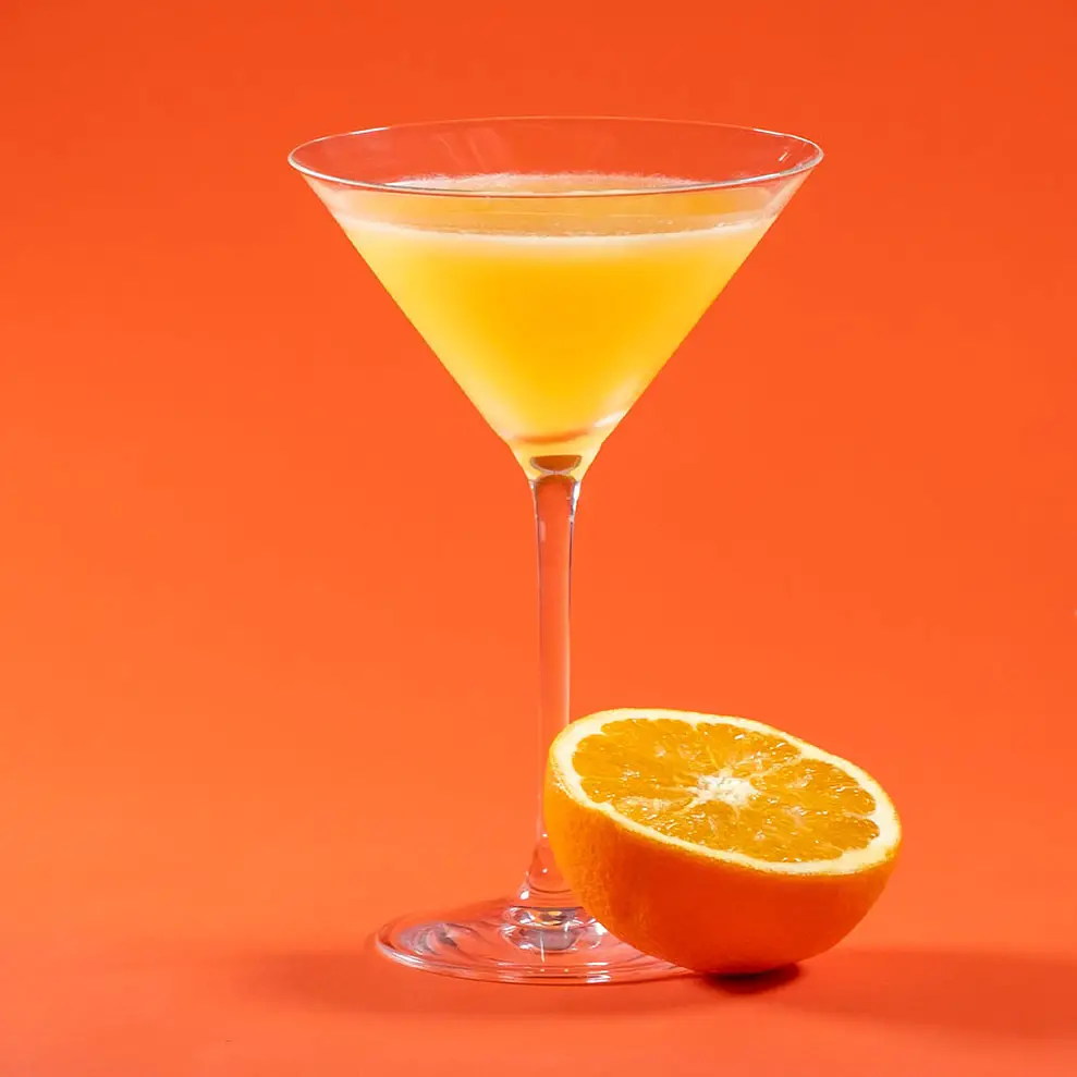 orange martini with half an orange